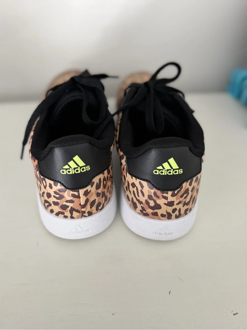 adidas woman’s Leopard Print Sneaker - Black, Tan